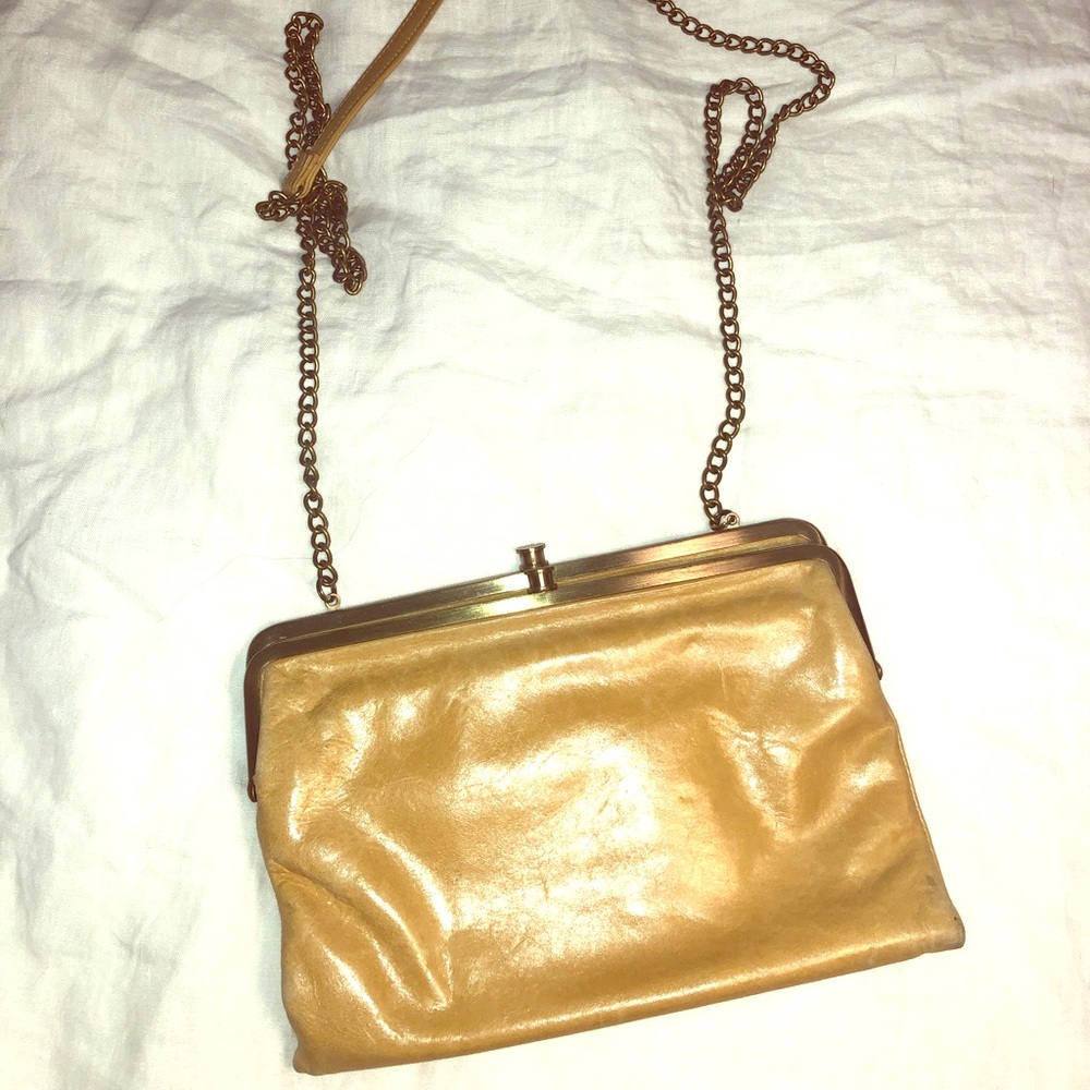 Hobo clutch with strap.
